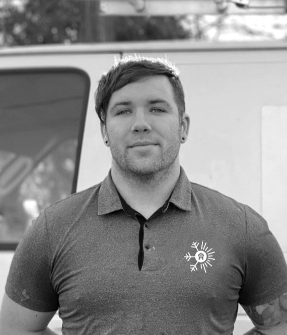 A.N.T. Comfort Solutions team member in front of company service van